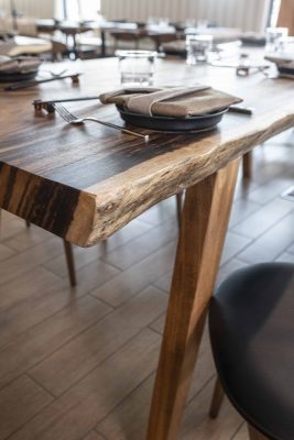 acacia wood dining table at Kojo